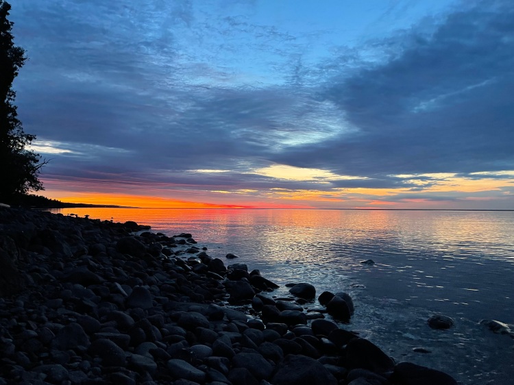 Sunrise with clouds in the sky.