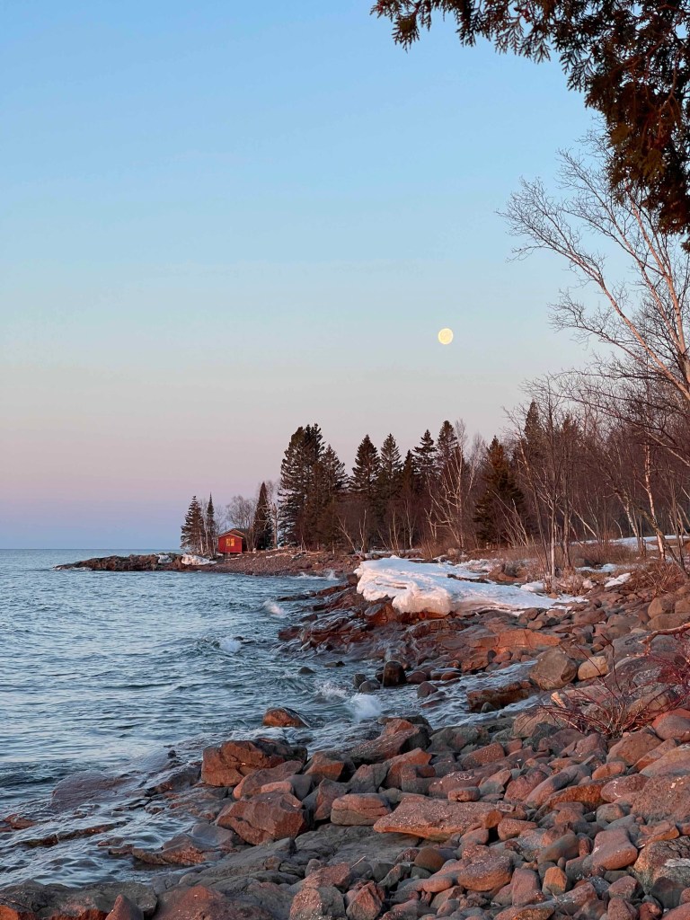 Moon over trees on Lake Superior.
