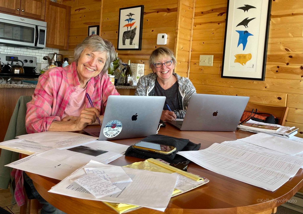 Phyllis Root, author and Kelly Povo, photographer, work on their next MN Wildflower book at Sea Villa E3.